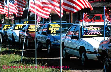 Stock Photo #2185: keywords - advertise american americana attention auto bright business car center commerce decorate flag getting horz lot sales sell trade transact used