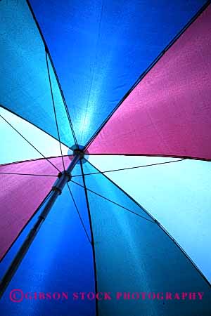 Stock Photo #2192: keywords -  abstract blue bright colorful geometric geometry pattern pie radial slices umbrella vert