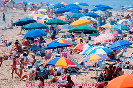 Stock Photo #16910: keywords -  array atlantic beach beaches city coast coastal coasts color colorful colors crowd crowded crowds horz hot leisure lots many maryland multitude numerous ocean outdoor outdoors outside people person sea seashore season shade shades shading shore shores summer sunny sunshine umbrella umbrellas vacation warm
