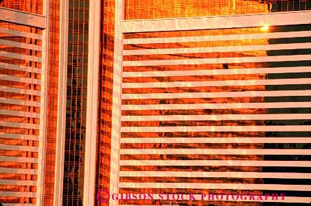 Stock Photo #2203: keywords -  architecture building floors gold grid horz hotel modern pattern reflection shiny square wall windows