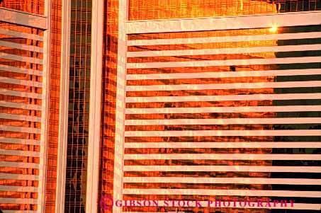 Stock Photo #2203: keywords - architecture building floors gold grid horz hotel modern pattern reflection shiny square wall windows