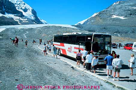 Stock Photo #14630: keywords - alberta athebasca bus buses busing canada commercial destination glacier horz jasper mass national park parked people road roads street streets tour touring tourist tourists tours transit transportation travel traveler travelers vacation vehicle