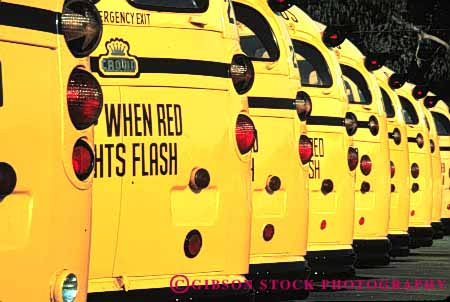 Stock Photo #6141: keywords -  arrange arranged bus buses caravan caravans children even group groups horz mass park parked pattern row school symmetrical symmetry transit transport transportation vehicle vehicles yellow