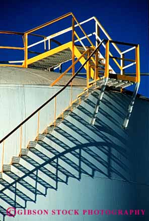 Stock Photo #2207: keywords -  climb geometric geometry graphic hardware industry metal paint shadow steel steps storage tank vert white yellow