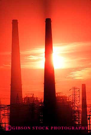 Stock Photo #2212: keywords -  dawn dusk electrical electricity energy generating industrial industry orange plant power silouette stacks sunrise sunset two vert