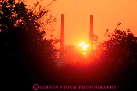Stock Photo #11425: keywords - dawn dusk energy equipment evening horz industry instrument machine machines morning nature pair power silhouette smoke stacks sun sunrise sunset technical technological technology texas two