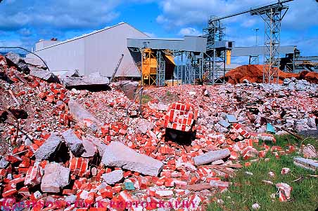 Stock Photo #12316: keywords -  abandon abandoned advance advancement brick bricks building california change dated demolish demolished destroy destroyed front horz in industrial industry manufacturing modern modernization modernize new of old out pile piles plywood site weed