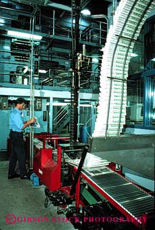 Stock Photo #2224: keywords -  assembly check communication contra costa equipment factory goss industry job line machine man manufacturing modern news newspaper press print publish quality times vert work