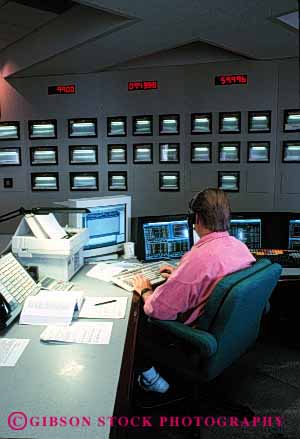 Stock Photo #2235: keywords -  & communications computer control digital display electricity electronic energy francisco gas grid high indicator industry job monitor pacific power profession room san system technician technology track utility vert work