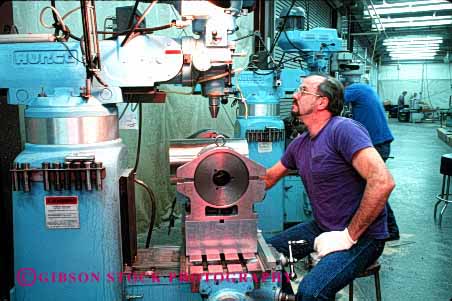 Stock Photo #2242: keywords - career construction drill drilling drills electric equipment factories factory horz in interior job jobs labor machine machines manufacture manufacturing men metal occupation operating operator people person press professional released shop shops skill stainless steel technician work worker workers working