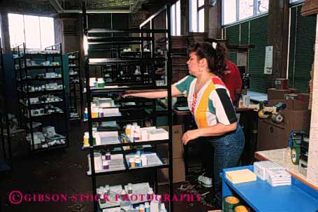 Stock Photo #2249: keywords - assembly box business commerce customer department employee employees fulfillment handle handled handles handling horz identify in inventory job jobs label line mail mailroom merchandise occupation occupations order package packages packaging parcel parcels people person process processes processing rack racks retail room send service shipping sort woman work worker workers working