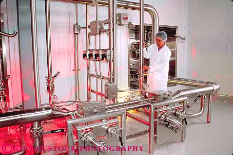 Stock Photo #11293: keywords -  asian bottling career clean employee equipment ethnic horz in industrial industry japanese job jobs machinery manufacture manufacturing metal minority occupation pipe pipes plant process processing released sanitary shiny stainless steel technical technician technological technology valves water woman women work worker workers working works