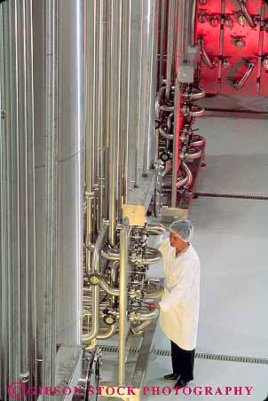 Stock Photo #11294: keywords - asian bottling career clean elevate elevated employee equipment ethnic in industrial industry japanese job jobs machinery manufacture manufacturing metal minority occupation pipe pipes plant process processing released sanitary shiny stainless steel technical technician technological technology valves vert view water woman women work worker workers working works