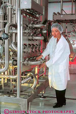 Stock Photo #11295: keywords -  asian bottling career clean employee equipment ethnic in industrial industry japanese job jobs machinery manufacture manufacturing metal minority occupation pipe pipes plant process processing released sanitary shiny stainless steel technical technician technological technology valves vert water woman women work worker workers working works