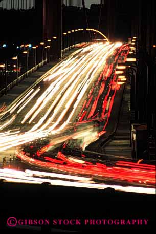 Stock Photo #2269: keywords -  auto blur bridge california car city commute drive exposure francisco gate golden hour light long motion movement night road rush san streak street time traffic transportation travel urban vehicle vert