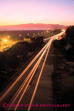 Stock Photo #2270: keywords -  auto beach blur california car city commute drive dusk exposure highway light long monica motion movement one road santa streak street sunset time traffic transportation travel urban vehicle vert