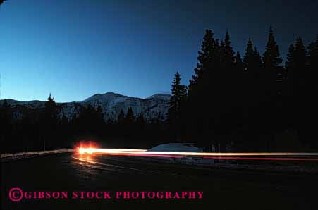 Stock Photo #2276: keywords -  alone blur car curve dusk exposure horz light long motion movement night solitary streak sunset time traffic