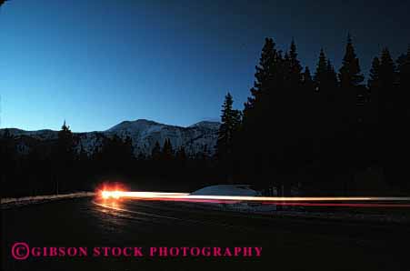 Stock Photo #2276: keywords - alone blur car curve dusk exposure horz light long motion movement night solitary streak sunset time traffic