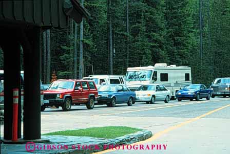 Stock Photo #2280: keywords -  admission auto busy car congestion crowd crowded entrance entry full gate glacier horz line montana national park pay register wait