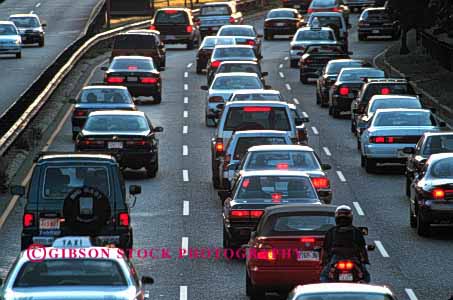 Stock Photo #2284: keywords -  boston bright bumper car caution commute congestion crowd drive dusk group highway horz hour jam massachusetts red road rush slow stop town traffic transportation urban vehicle wait