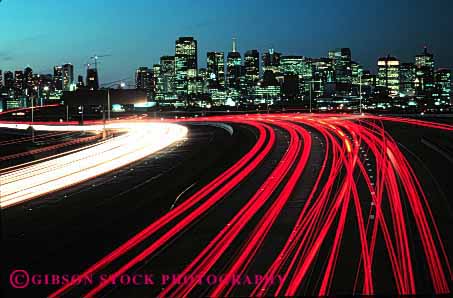 Stock Photo #2289: keywords -  abstract blur bright california car cityscape commute congestion curve distort downtown drive dusk exposure francisco freeway highway horz hour interstate light long motion movement night red road rush san skyline streaks street time traffic transportation vehicle