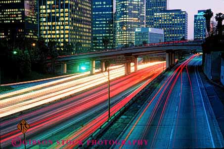 Stock Photo #2290: keywords - abstract angeles blur bright california car cityscape commute congestion curve distort downtown drive dusk exposure freeway highway horz hour interstate light long los motion movement night red road rush skyline streaks street time traffic transportation vehicle