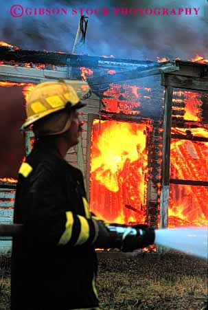 Stock Photo #2309: keywords -  building burn burning career caution danger emergency fight fire fireman flame home hose hot house income job occupation public risk safety service suit uniform vert vocation water work