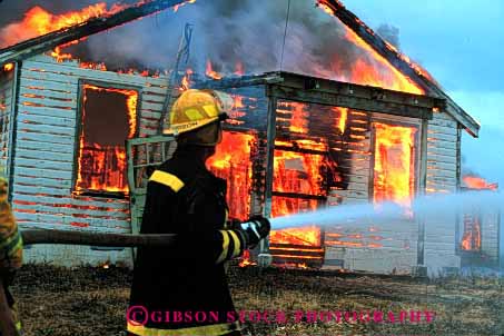 Stock Photo #2310: keywords -  building burn burning career caution danger emergency fight fire fireman flame home horz hose hot house income job occupation public risk safety service suit uniform vocation water work