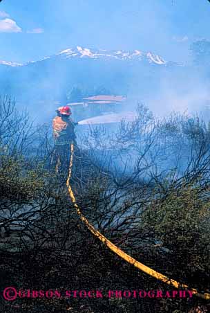 Stock Photo #2322: keywords -  air brush career emergency fight fire firefighter fireman firemen hose job pollution public service smoke team vert vocation wildfire work