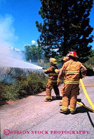 Stock Photo #2323: keywords -  air brush career cooperate emergency fight fire firefighter fireman firemen hose job pollution public service smoke team vert vocation water wildfire work