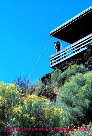 Stock Photo #2326: keywords -  alarm binoculars cabin california career communicate elevated emergency female fire forest high hilltop isolated job lookout modoc observe occupation panoramic remote report see smoke station vert view vocation woman work