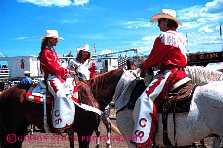 Stock Photo #2340: keywords -  alone animal colorful costume decorate female group horseback horz not outdoor performance private relax released rodeo show summer team woman women