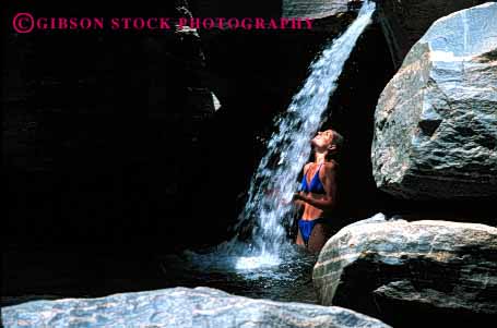 Stock Photo #2343: keywords -  alone bathing clean cool female fresh happy horz outdoor private refresh relax released smile suit summer swim teenager water waterfall wet woman young