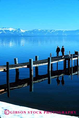 Stock Photo #2354: keywords -  alone chat communicate dock female intimate lake outdoor private relationship relax share talk together vert walk water winter women
