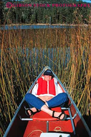 Stock Photo #2359: keywords -  alone boat canoe female lake outdoor private quiet relax released solitude summer vert woman