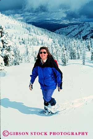 Stock Photo #2363: keywords -  alone cold conditioning exercise female happy hike outdoor private recreation relax released smile snow snowshoe sport vert walk winter woman workout