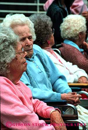 Stock Photo #2364: keywords -  aged elderly female gray group hair not old outdoor relationship relax released senior share talk together vert wheelchairs women