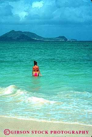 Stock Photo #2372: keywords -  alone bathing beach clean coast colorful female ocean outdoor peaceful private quiet relax released shore suit summer swim travel tropical vacation vert wade warm water woman