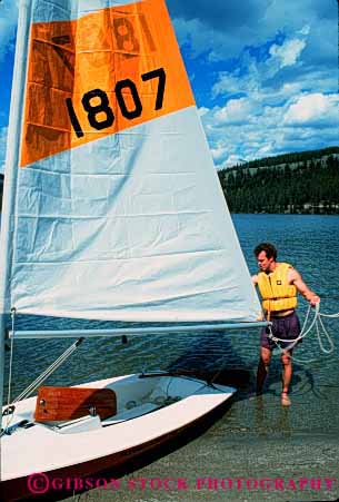 Stock Photo #2376: keywords -  boat flotation fun jacket lake life man play recreation released resort safety sail sport summer vacation vert water