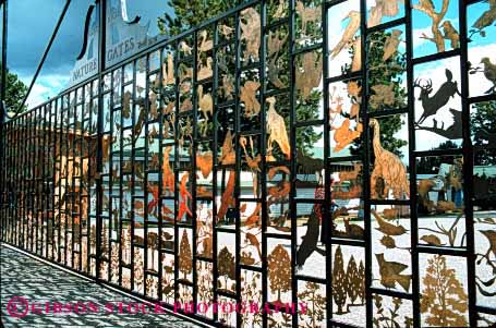 Stock Photo #2389: keywords - animal barrier fence gate geometric geometry horz metal pattern row security silhouette strong symmetrical