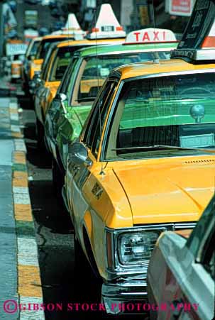Stock Photo #2392: keywords -  auto cab car drive francisco line road row san street taxis transportation vehicle vert wait