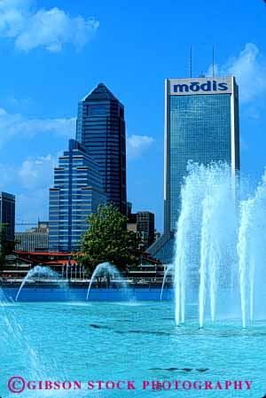 Stock Photo #6138: keywords -  architecture building buildings city cityscape daytime downtown fountain friendship jacksonville modern office pool skyline splash spray squirt vert water