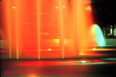 Stock Photo #6139: keywords -  blur color colorful dusk exposure fountain friendship horz jacksonville light lighted lighting orange red splash spray squirt time water
