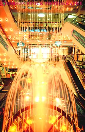 Stock Photo #16940: keywords - bright color colorful colors decorate decorated decorative design designed designs display displayed displaying displays downtown fountain fountains hawaii indoor indoors inside interior light lighting lights lit mall malls municipal oahu orange plaza public shopping show showing shows splash splashed splashes splashing spray sprayed spraying sprays squirt squirted squirting squirts up upward upwards urban vert waikiki water yellow