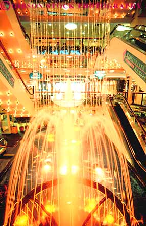 Stock Photo #16940: keywords -  bright color colorful colors decorate decorated decorative design designed designs display displayed displaying displays downtown fountain fountains hawaii indoor indoors inside interior light lighting lights lit mall malls municipal oahu orange plaza public shopping show showing shows splash splashed splashes splashing spray sprayed spraying sprays squirt squirted squirting squirts up upward upwards urban vert waikiki water yellow