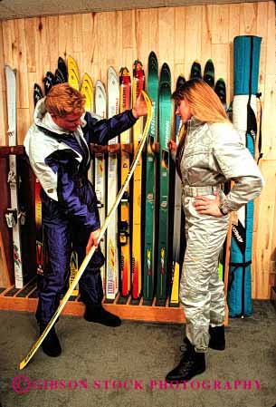 Stock Photo #2411: keywords -  boot business buy buyer colorful consumer couple downhill equipment fitting man merchandise model released shop shopping ski skis snow sport store suit vert winter woman