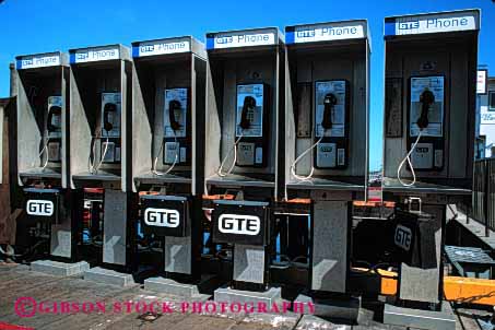 Stock Photo #2420: keywords -  booth call communication horz identical many multiple pattern phone repetition row symbol telephones