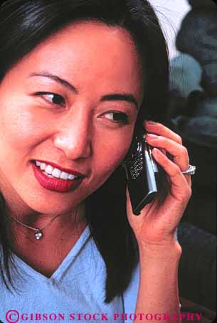 Stock Photo #11075: keywords -  accessory asian attractive battery beautiful black cell cellular cheerful chin communicate communications compact cordless devise digital ethnic eye eyes face female foreign hair hand happiness happy head hold holding into japanese joy listen listening listens minority modern mouth new nose people person phone portable powered pretty released remote smile smiles smiling talk talking talks technology teeth telephone use uses using vert wireless woman women