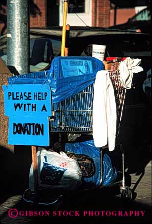 Stock Photo #2438: keywords -  beg broke cart destitute donate donation homeless jobless panhandle person plea poor rejected sad sign unemployed vert