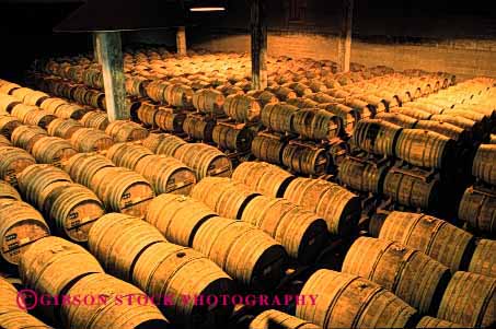 Stock Photo #2442: keywords - aging barrel barrels brandy california container cylinder distillery horz many napa pattern pile rms round row stack wine